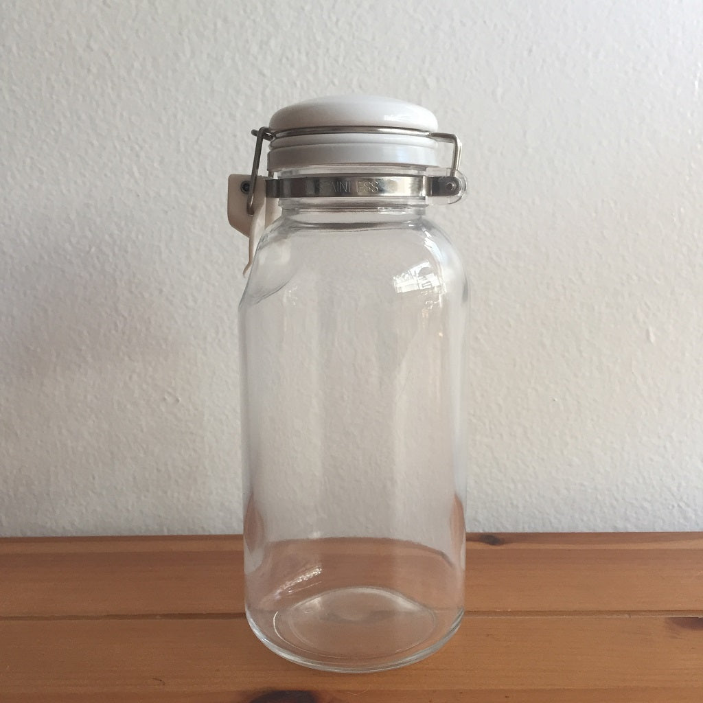 Glass jar with handle and screw cap